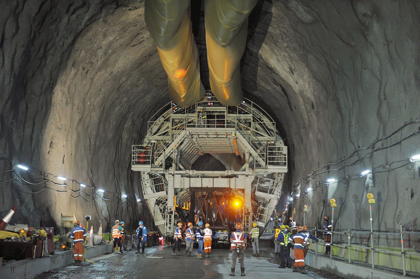 TBM backup gantry with lining erector and engineering crew
